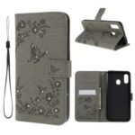 For Samsung Galaxy A30 / A20 Imprinted Butterfly Flowers Rhinestone Flip Wallet Leather Stand Phone Case – Grey